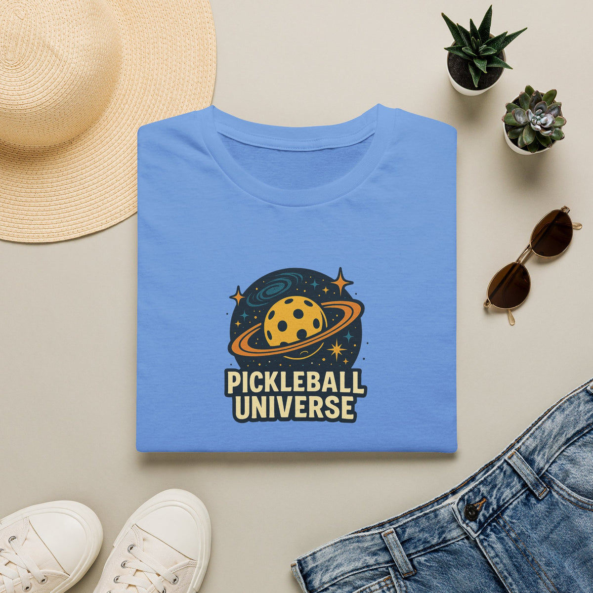 Sats and Stripes Pickleball Universe T-Shirt Fun Space Pickleball Graphic Tee Sky Blue Folded