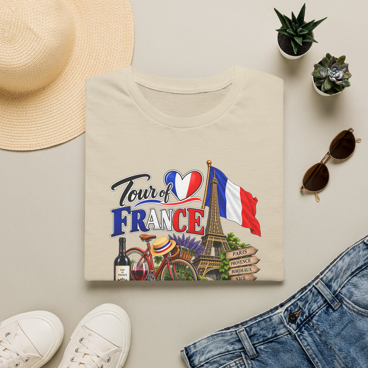 SatsandStripes.com Tour of France Softstyle® T-Shirt – Paris Eiffel Tower French Travel Graphic Tee Sand Folded