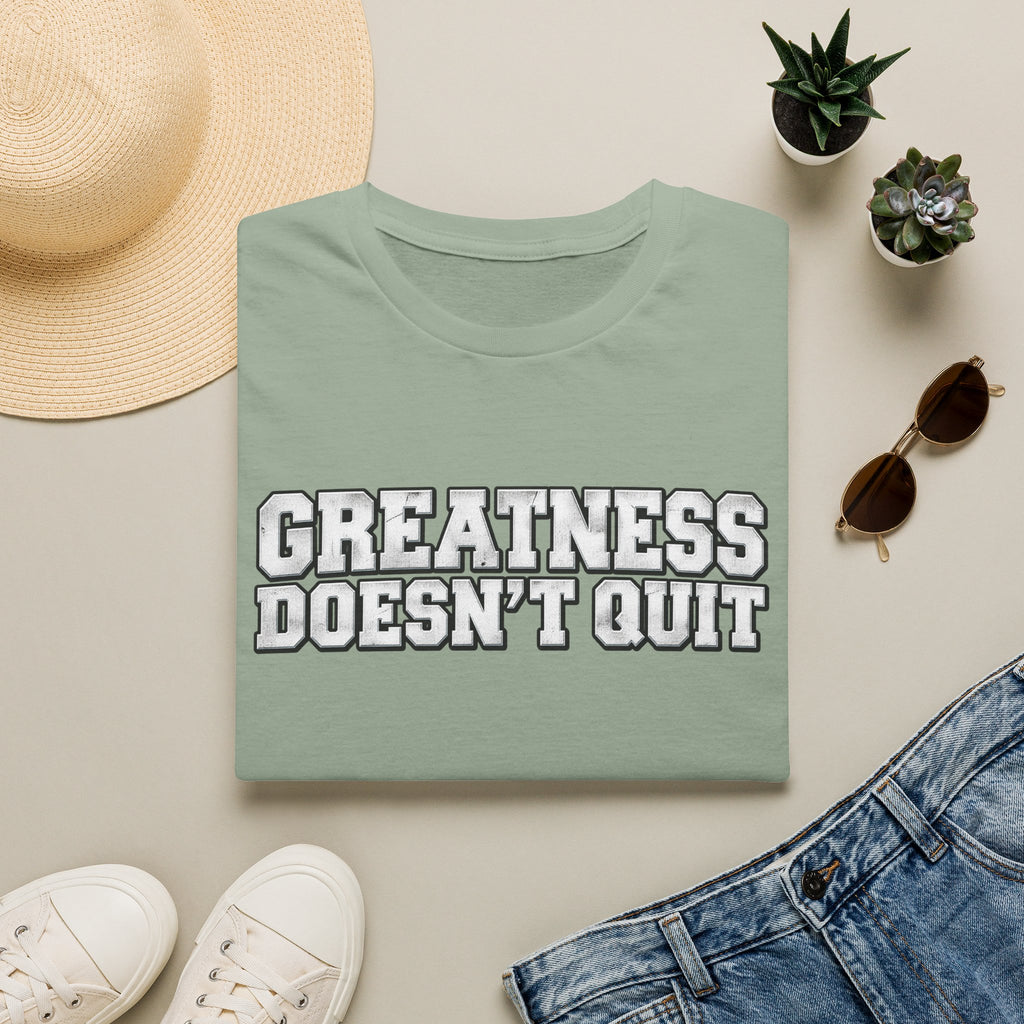 SatsandStripes.com Greatness Doesn’t Quit Softstyle® T-Shirt – Motivational Graphic Tee, Inspirational Shirt, Positive Mindset Gift for Men & Women Sage Folded
