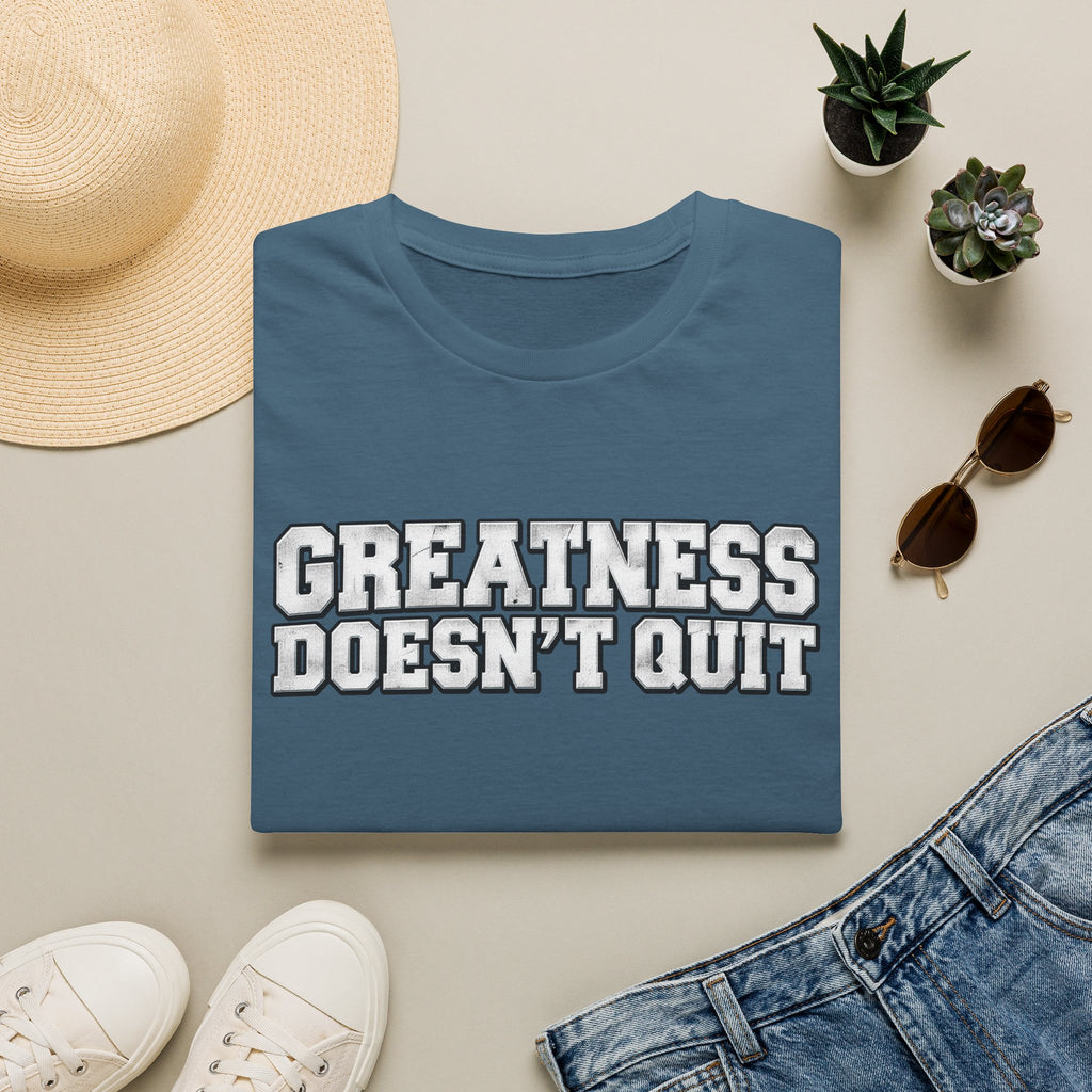 SatsandStripes.com Greatness Doesn’t Quit Softstyle® T-Shirt – Motivational Graphic Tee, Inspirational Shirt, Positive Mindset Gift for Men & Women Indigo Blue Folded